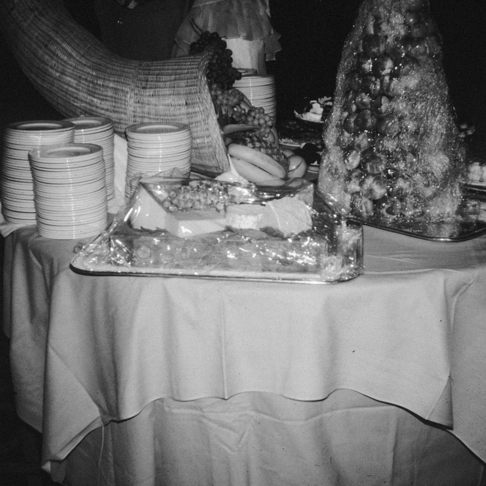 Party spread with stacked plates — a birthday calendar that works