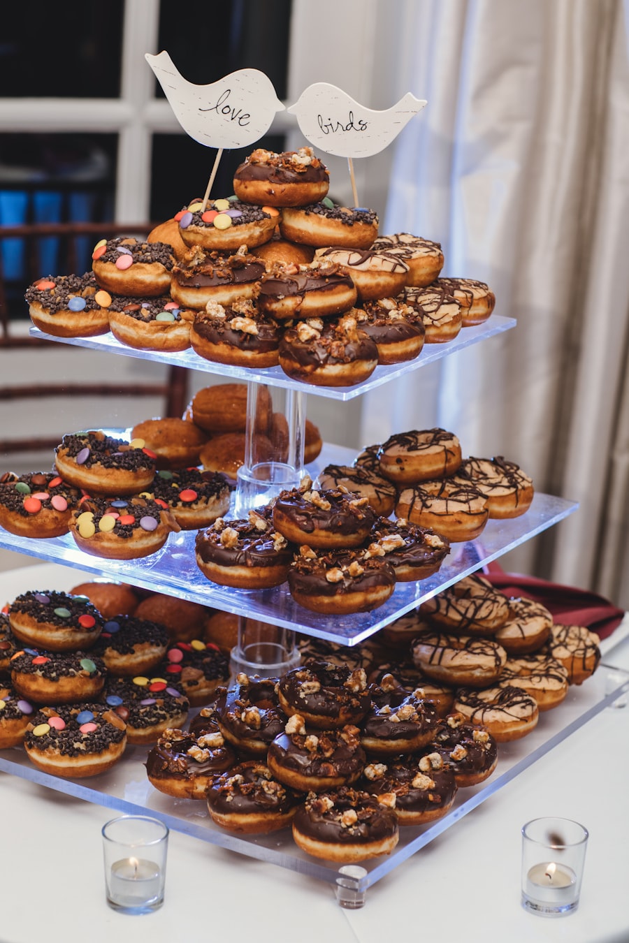 Tiered display of assorted donuts arranged in rings