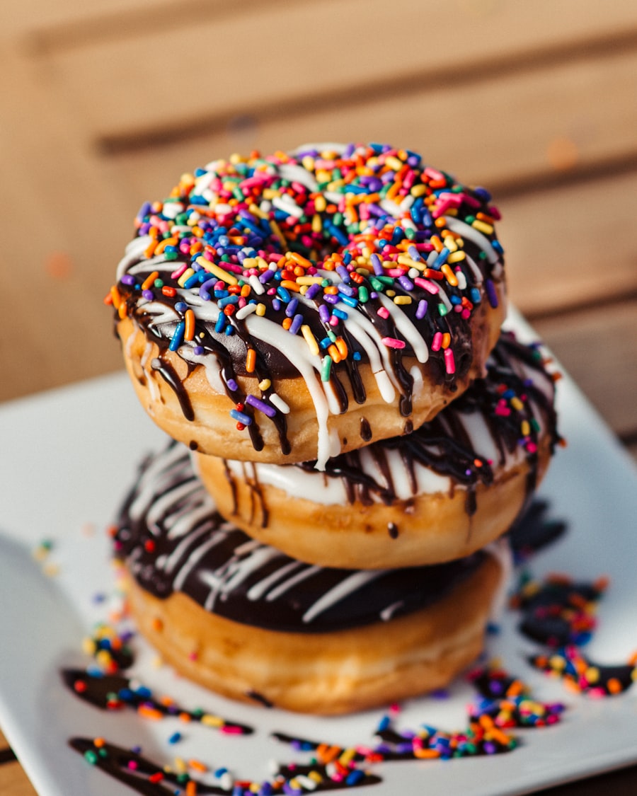 Stacked sprinkle-frosted donuts for a birthday coffee pairing