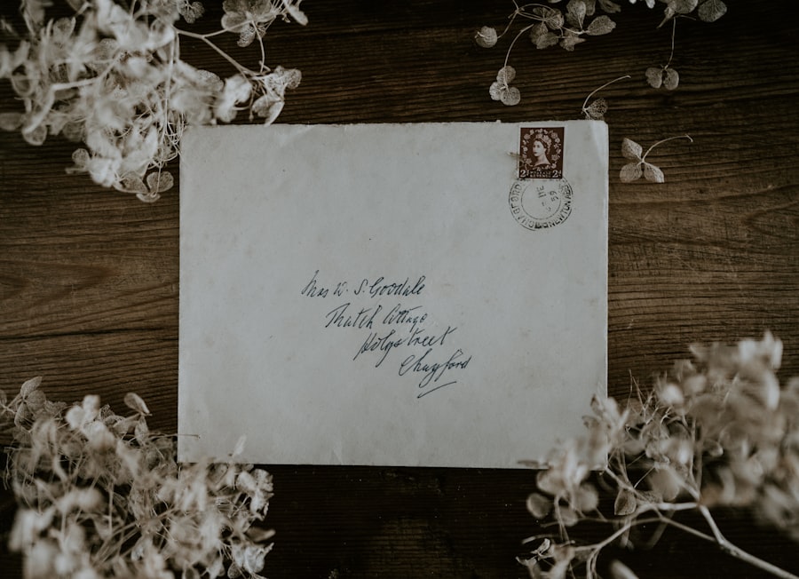 Invitation card laid flat, signed by the whole team