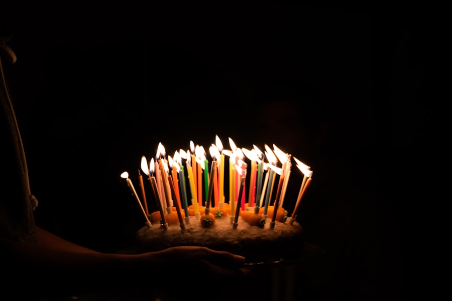 Lit birthday candles crowning the top of the display