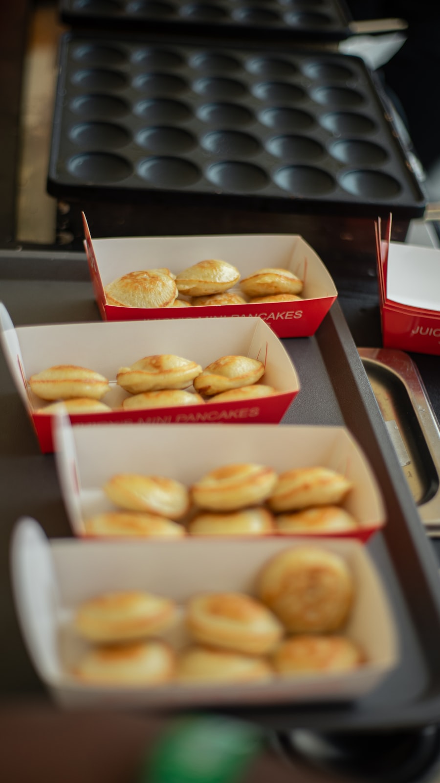 Trays of fresh treats lined up for an office celebration
