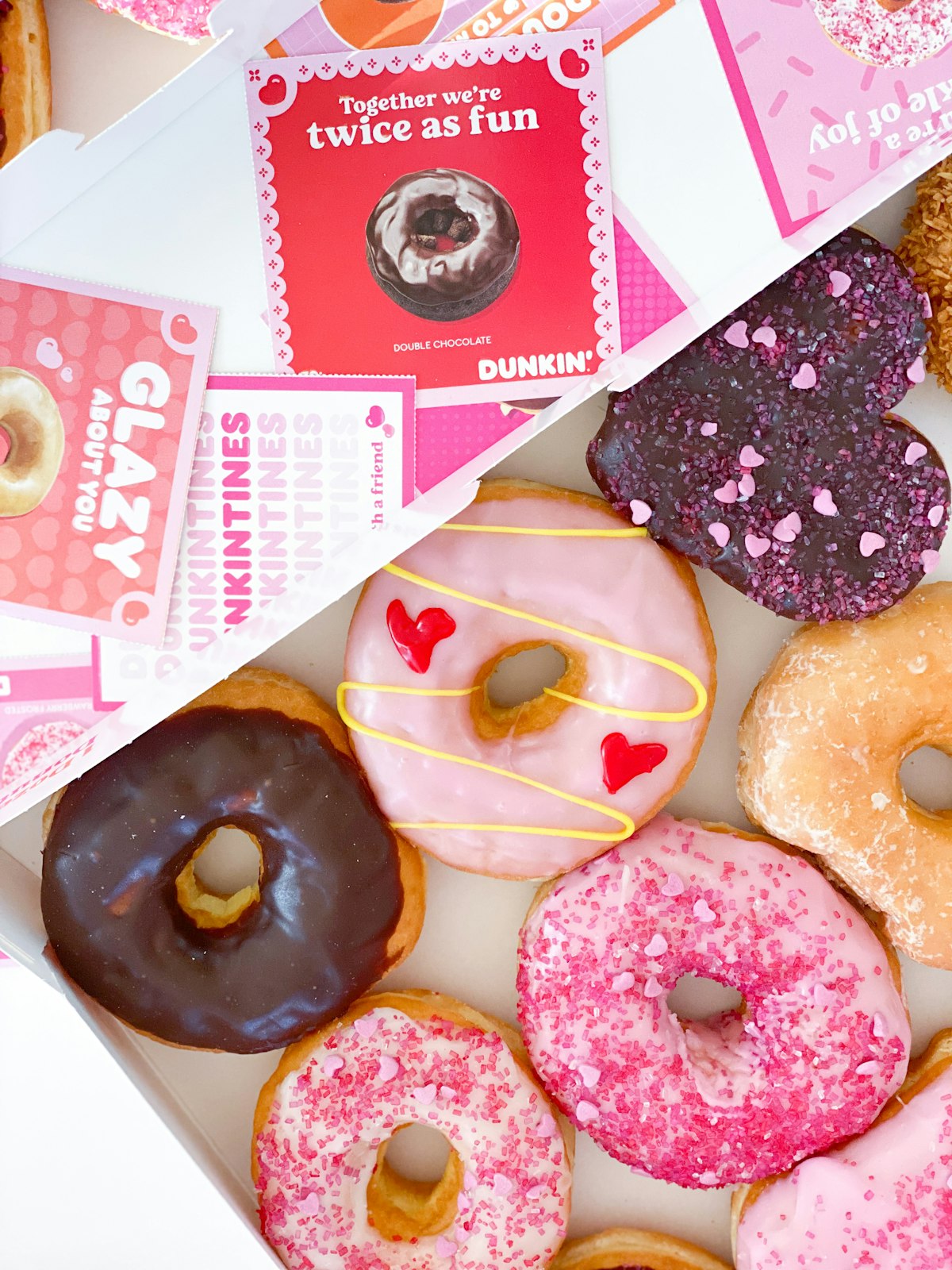 Pink and white birthday donut box ready for delivery