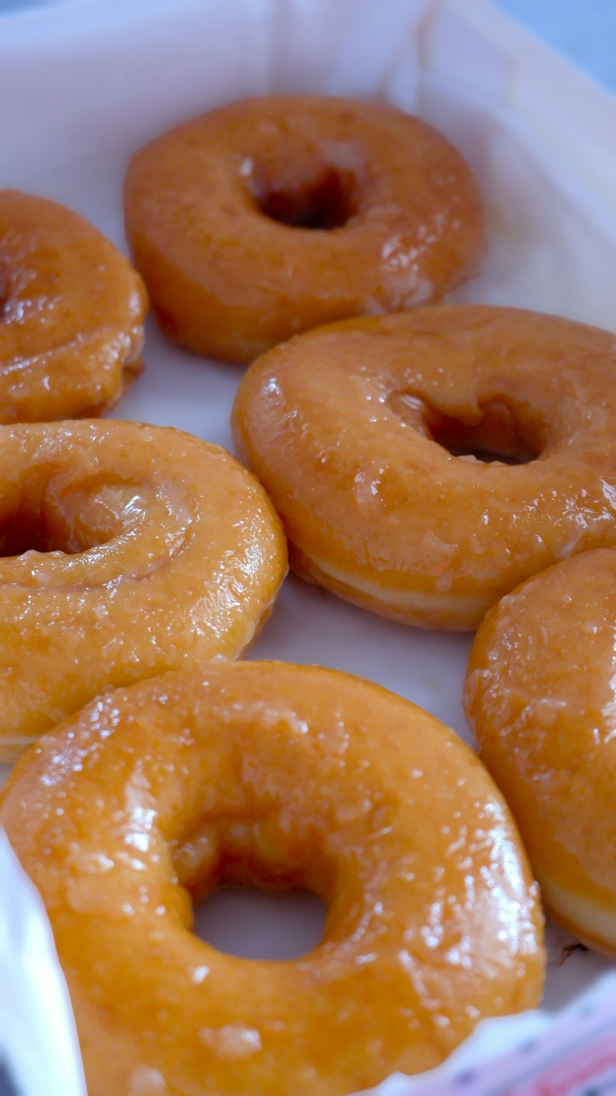 Box of glazed donuts packed and ready to send